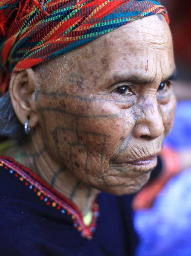 黎族纹身来源,海南黎族的纹身