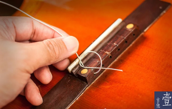 北航吉他,如何换吉他新弦