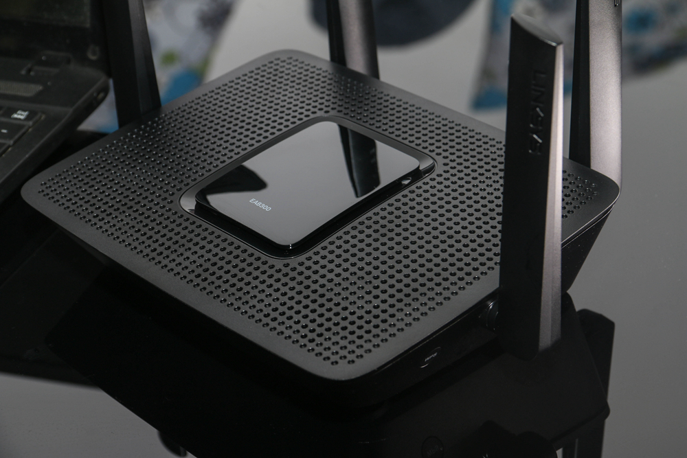 买个路由器能解决网速慢的问题吗,花1000多买路由器