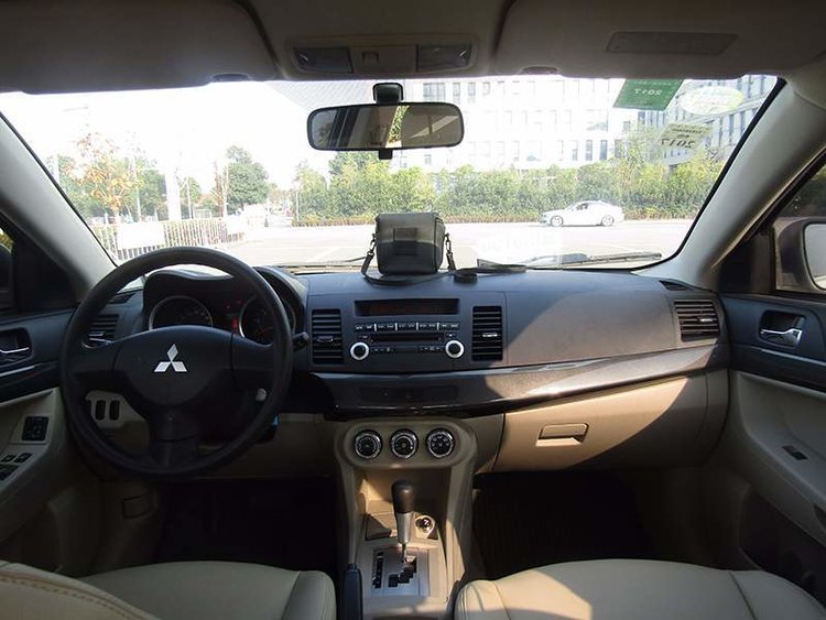 三菱evo油箱盖和翼神的区别,evo民用汽车