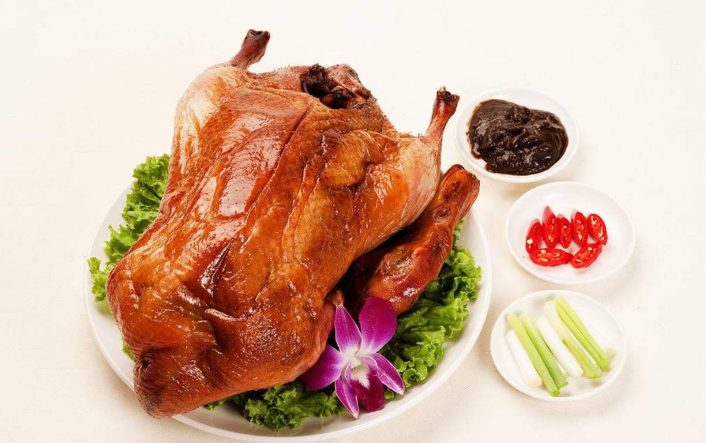 简述北京烤鸭的制作工艺流程,北京烤鸭的制作流程英语