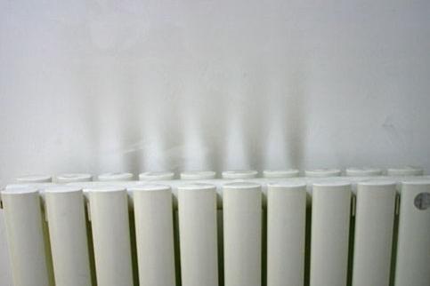 如何防止暖气片熏黑墙面,暖气片把白墙都烤黑了有什么办法