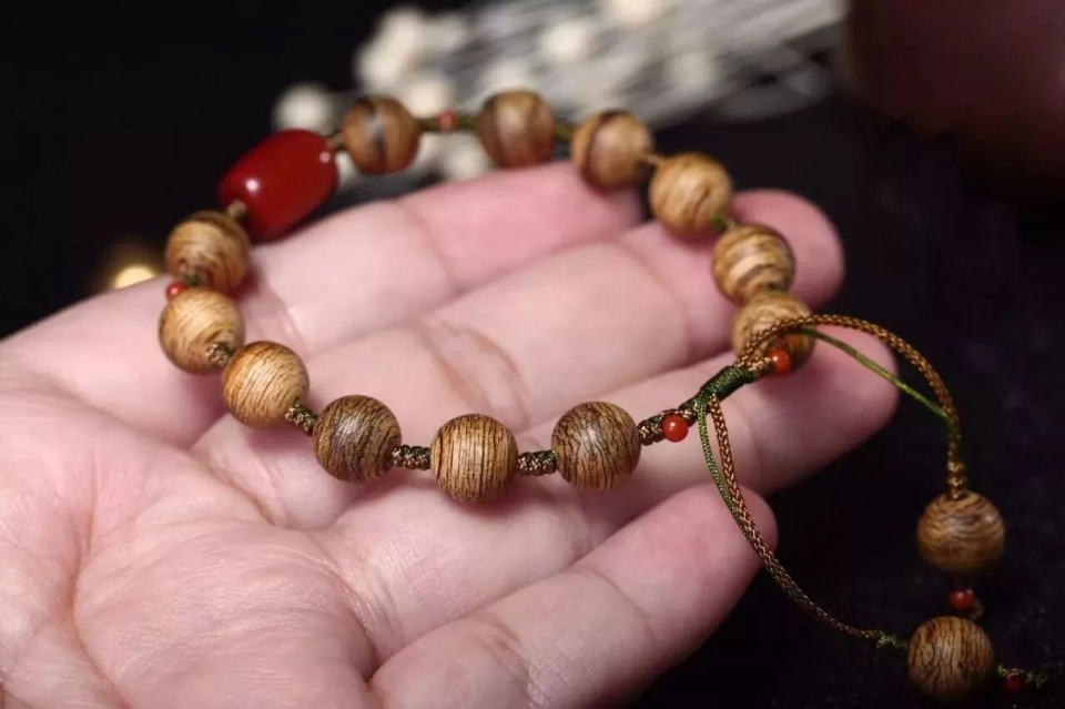 108颗手串四圈太紧三圈太松怎么办,小叶紫檀手串盘玩袋使用方法