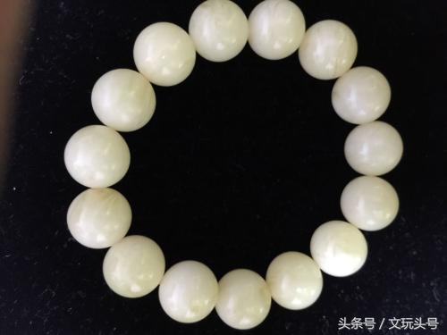 半蜜半珀的蜜蜡和白花蜜蜡哪个好,蜜蜡中白蜜蜡好还是白花蜜蜡好