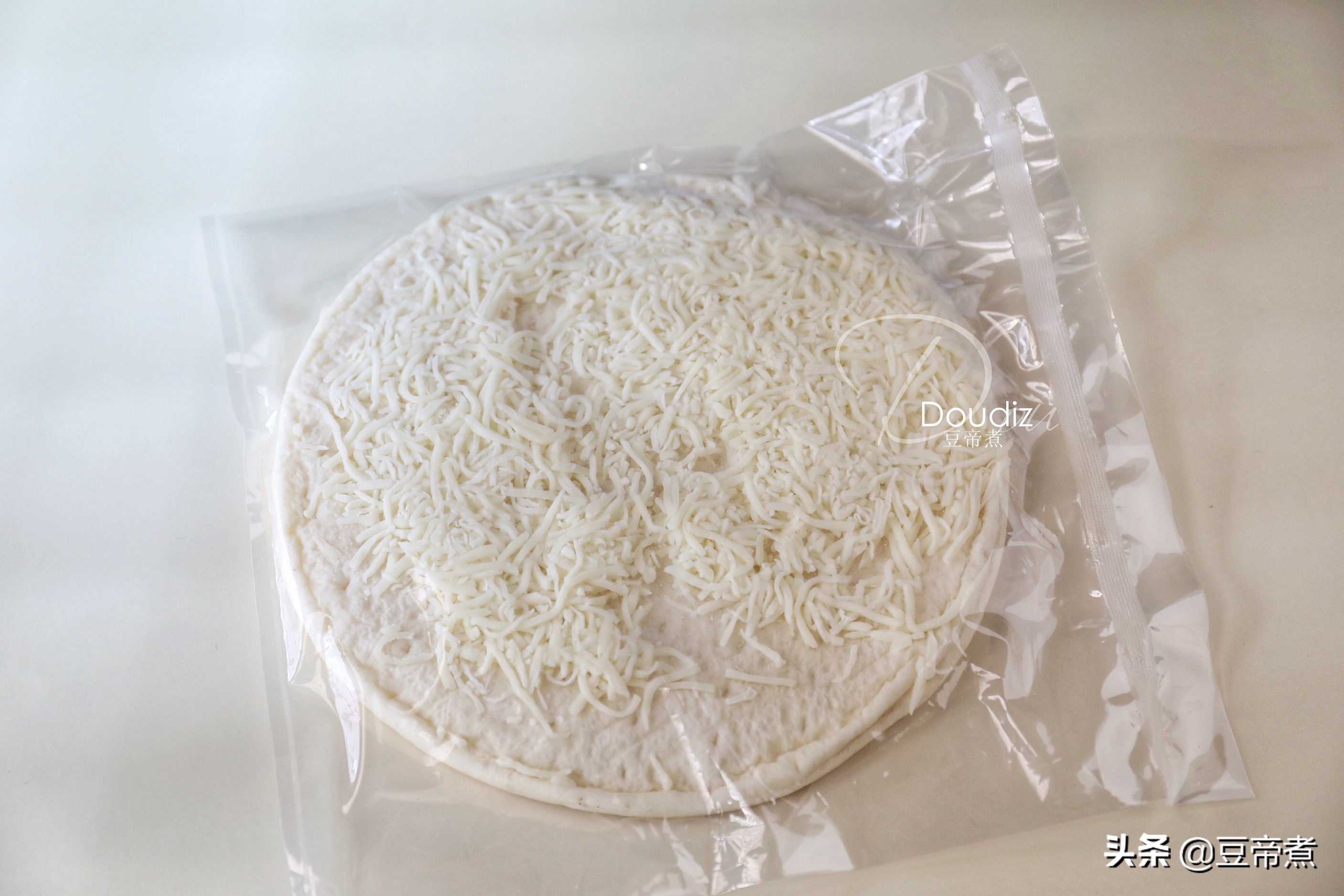 为什么自己烤的披萨胚不脆,为什么现实中的披萨不会拉丝