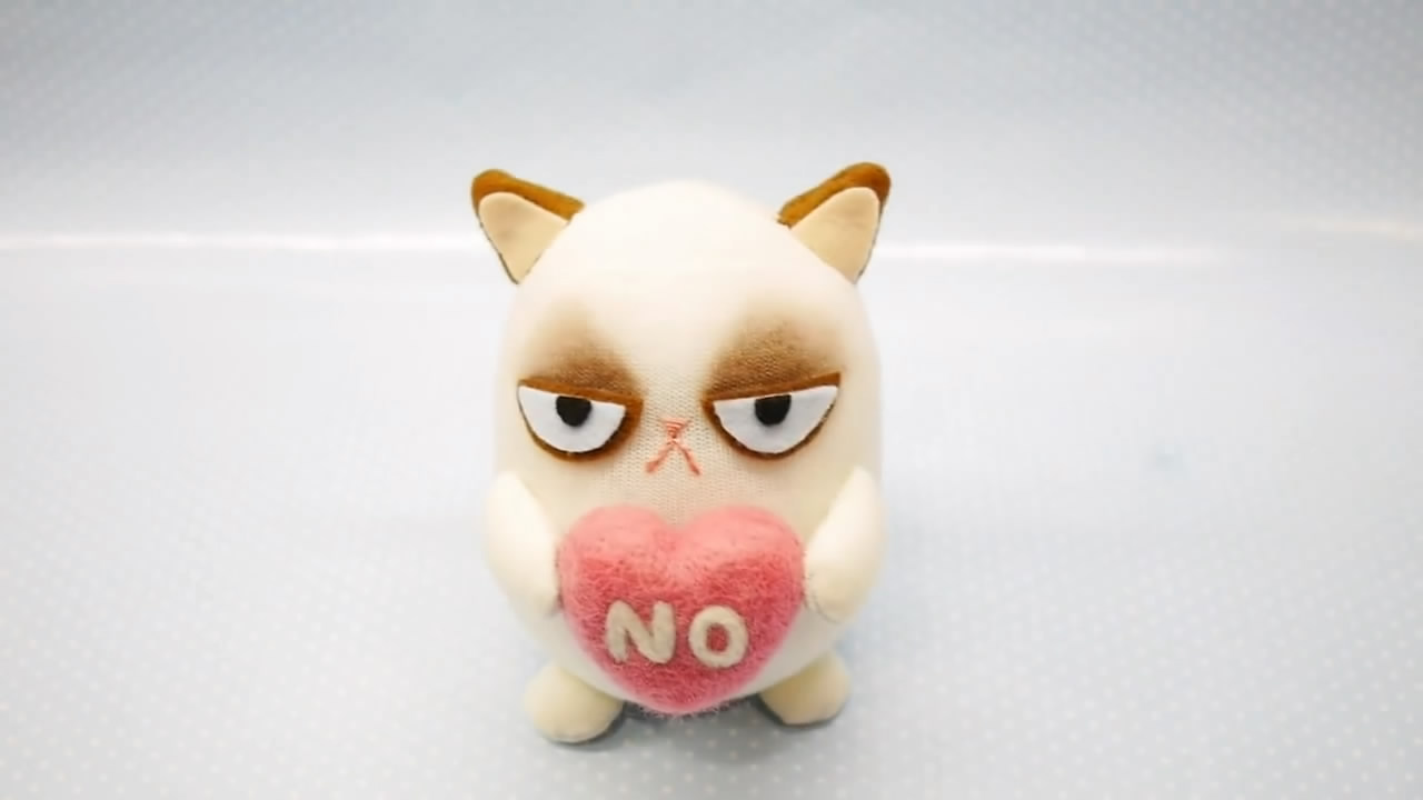 猫袜子怎么做又简单又漂亮,怎么用袜子做小猫