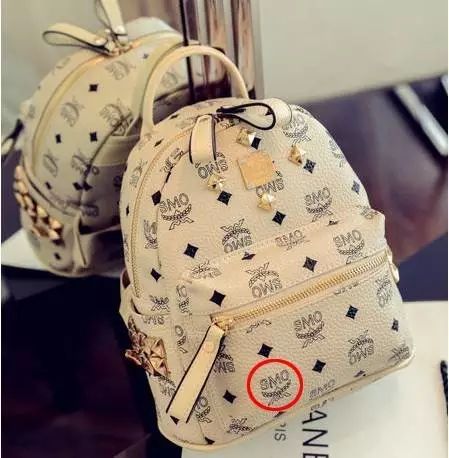 mcm新款铆钉包,mcm铆钉款邮差包怎么辨别真假