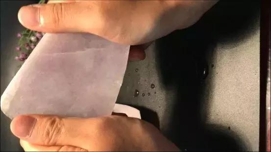 水翻砂紫罗兰翡翠原石,会卡翡翠原石脱沙料