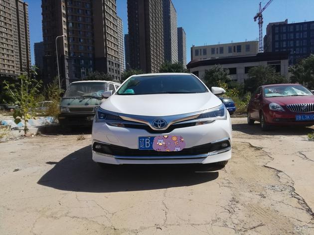 丰田卡罗拉双擎跑多少公里后省油,卡罗拉双擎和凯美瑞双擎哪个省油