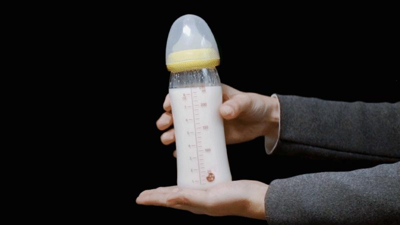 冲完奶粉后奶瓶上有黄色的结块,冲完奶粉奶瓶上挂壁有小颗粒