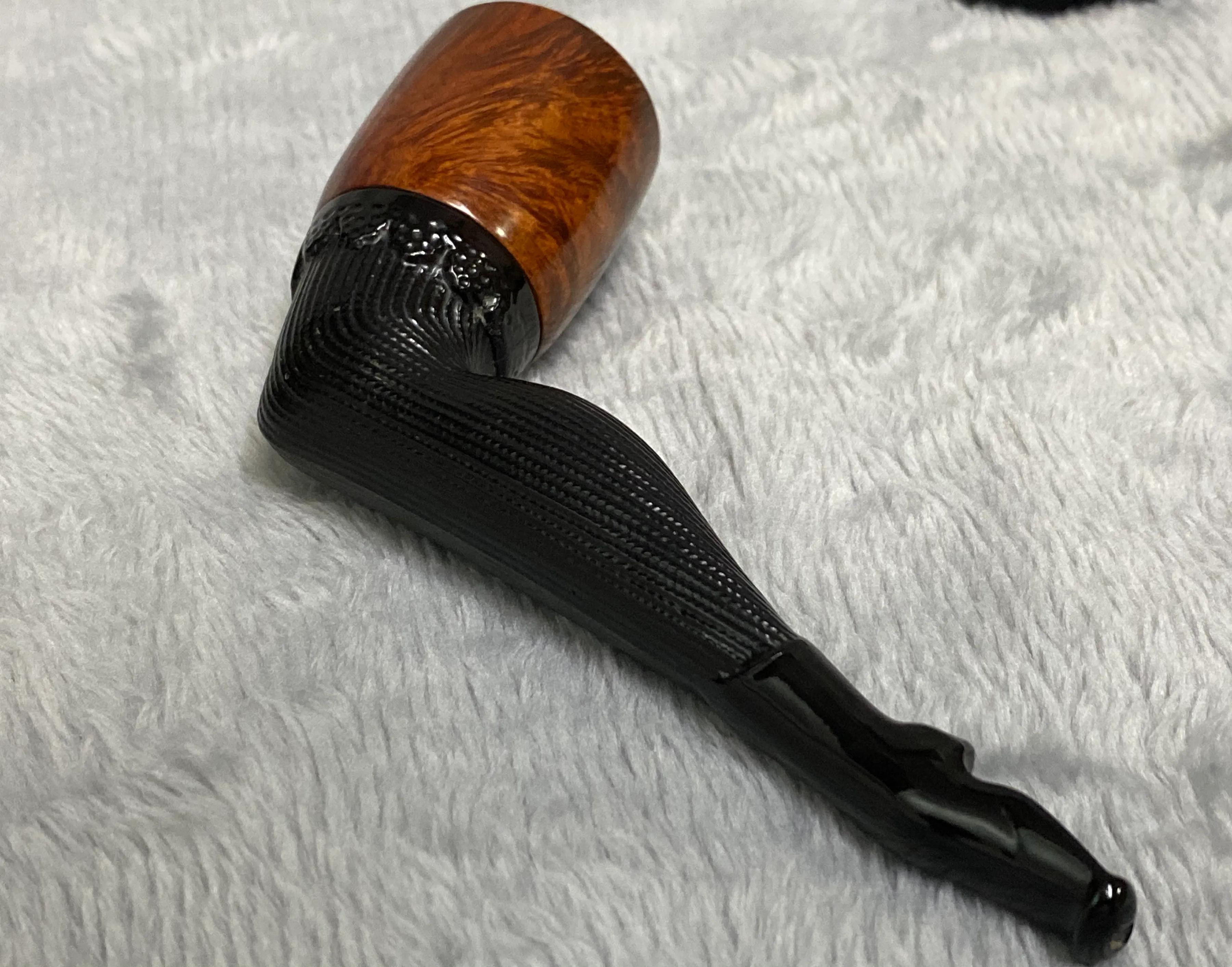 这是一把至今无人敢卖又浏览量奇高的手工石楠木黑丝蕾丝大腿斗