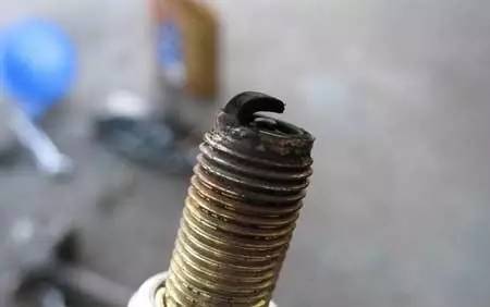 更换火花塞质保终身,火花塞一定要换原厂的吗