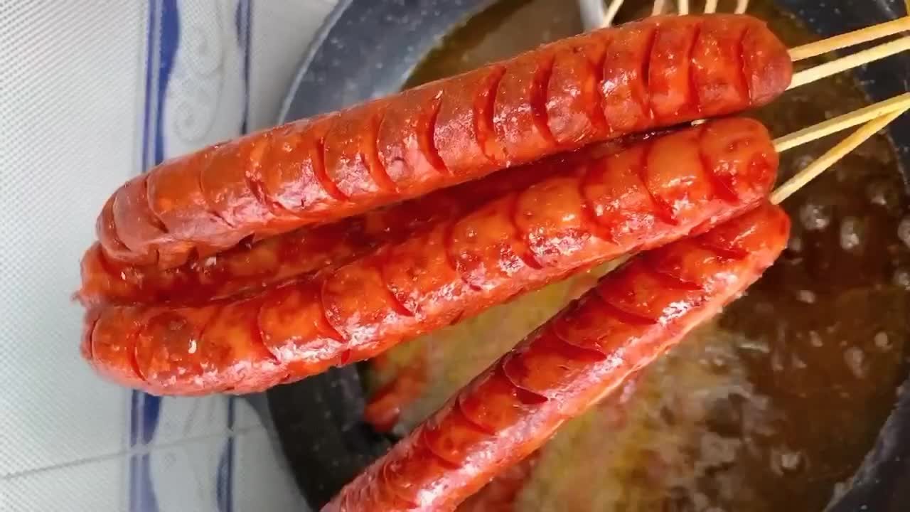 脆皮油炸火腿肠,油炸火腿肠时表面一层糊状是什么