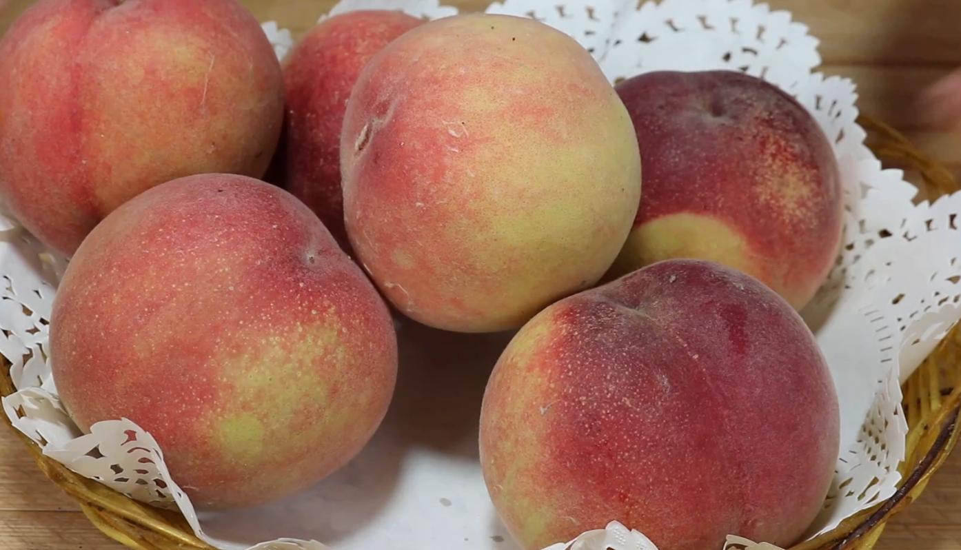 买桃子该怎么挑选呢,桃子怎么辨别甜酸