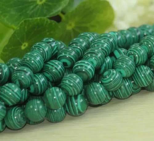 天然孔雀石真假辨别,孔雀石散珠真假鉴别方法