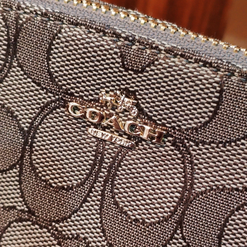 蔻驰包包经典入门款,蔻驰经典款马鞍包