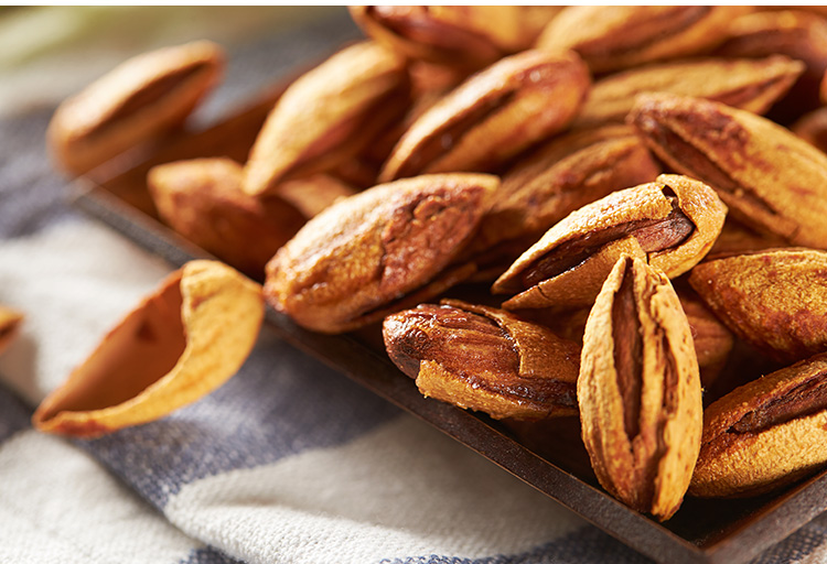 平时吃的杏仁是什么样的杏子,干果杏仁是吃的杏果核吗