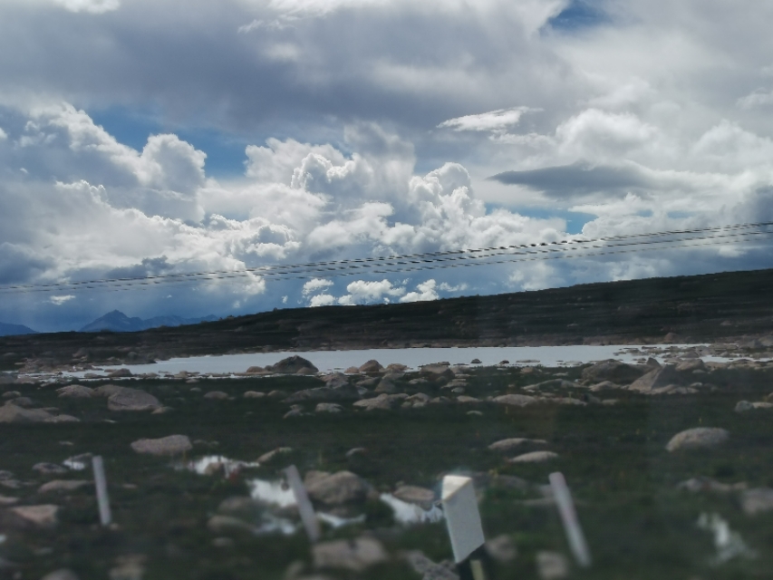 雅江到稻城香格里拉镇多少公里,理塘到稻城香格里拉镇