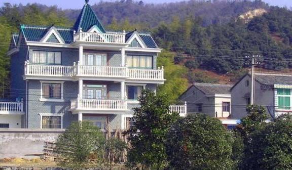 农村外墙不贴瓷砖有什么讲究,农村盖房为啥侧面不粉刷