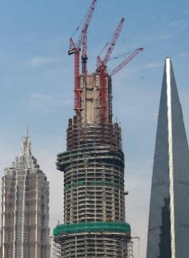 上海金茂大厦总造价是多少,上海中心大厦与金茂大厦的对比