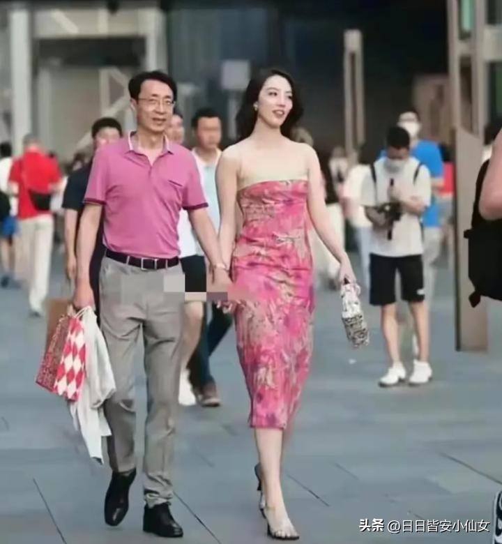 中石油高管情侣装,中石油老总情侣