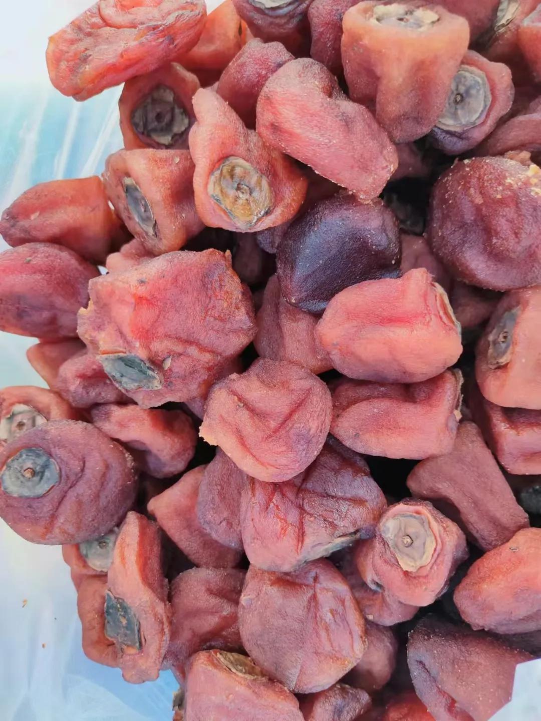 野柿子怎么晒干,硬柿子削皮晒干