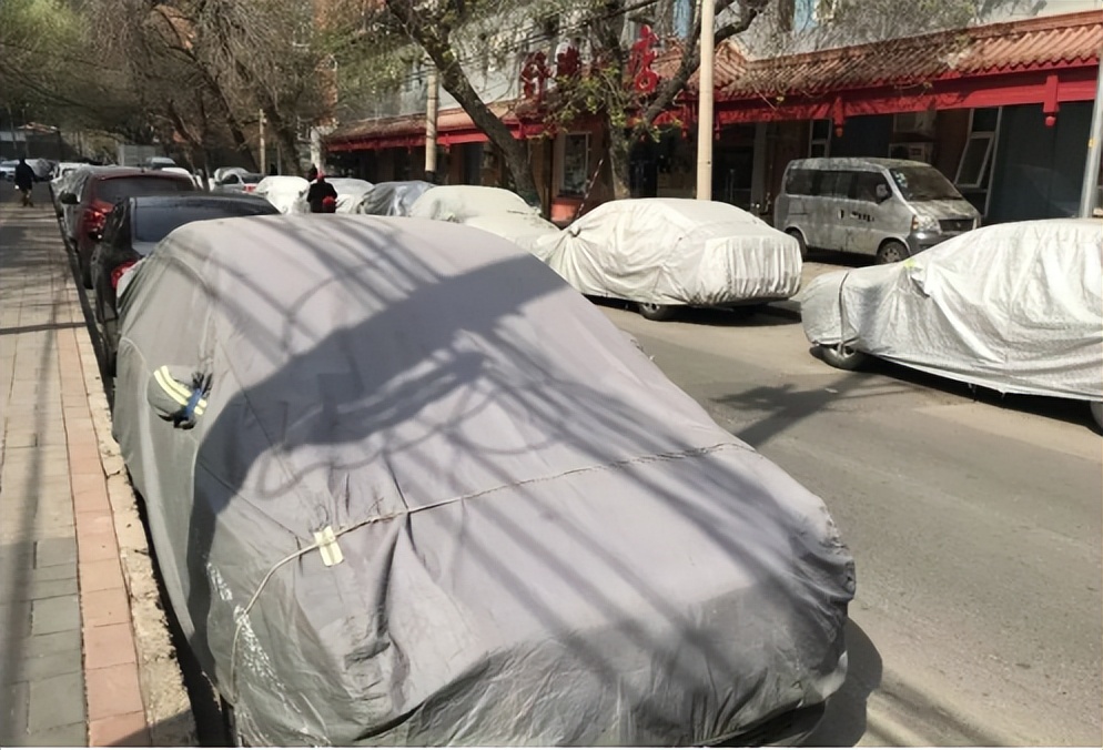 停车位罩车衣扣分吗,汽车停车罩车衣扣12分