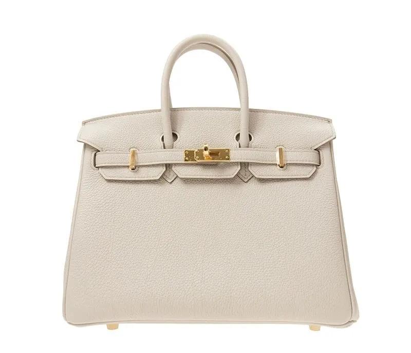 第一个包买lv还是圣罗兰,第一只包买lv还是迪奥