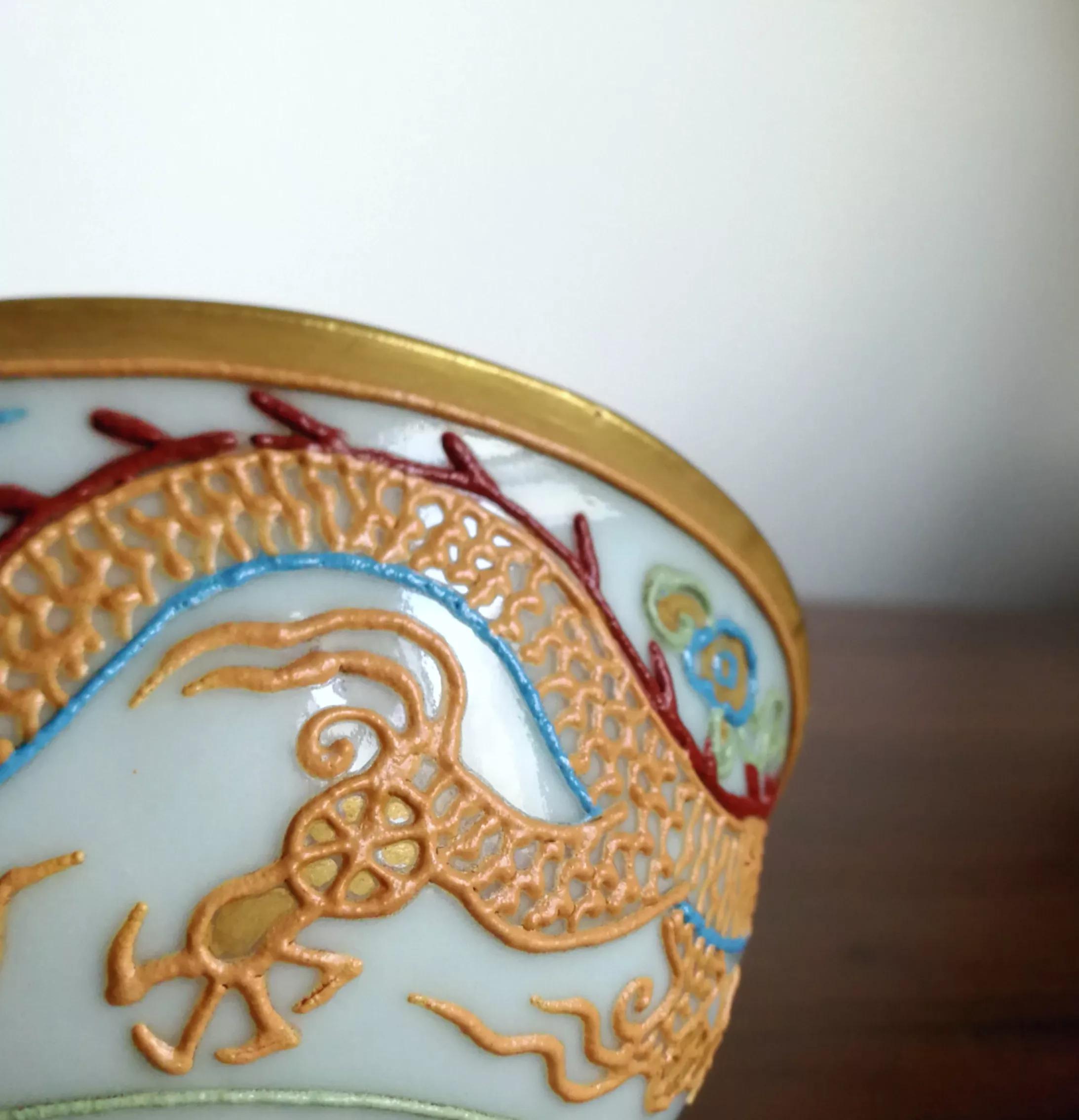 乾隆年制祭红釉珐琅彩高足杯价值,明代民窑青花瓷鸟纹压手杯