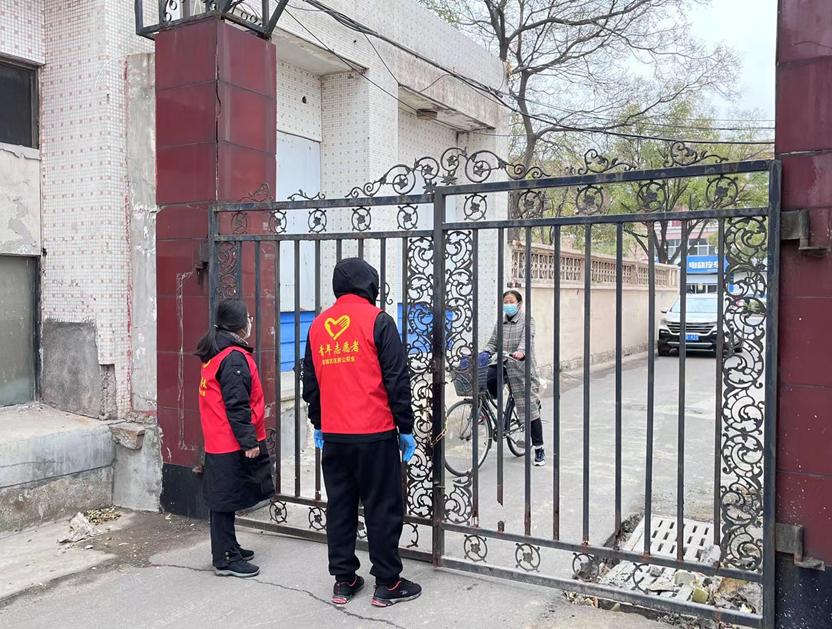 志愿者助力社区疫情防控敲门行动,北蔡镇疫情防控志愿者服务队