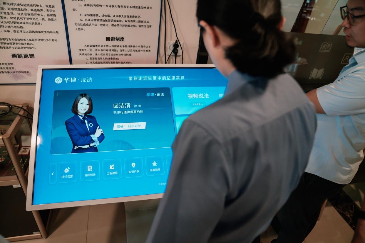 万安街道举行“法治进社区工作点”授牌仪式