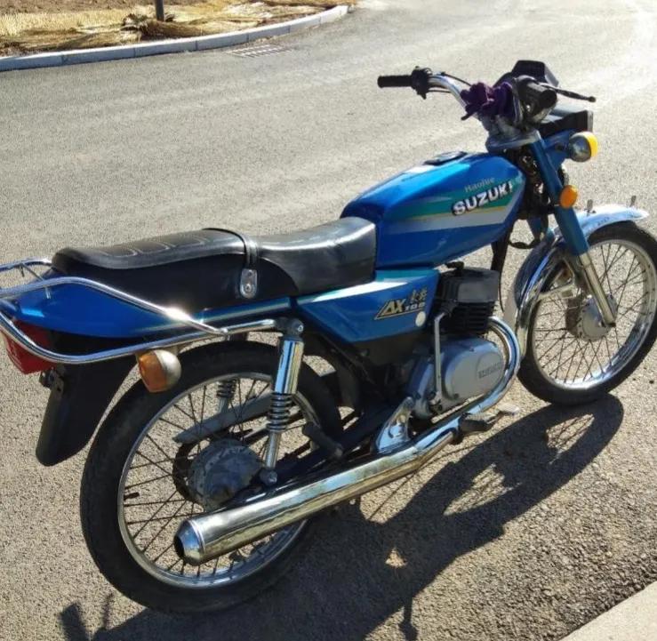 金城铃木ax100和豪爵ax100区别,九十年代一代神车铃木ax100