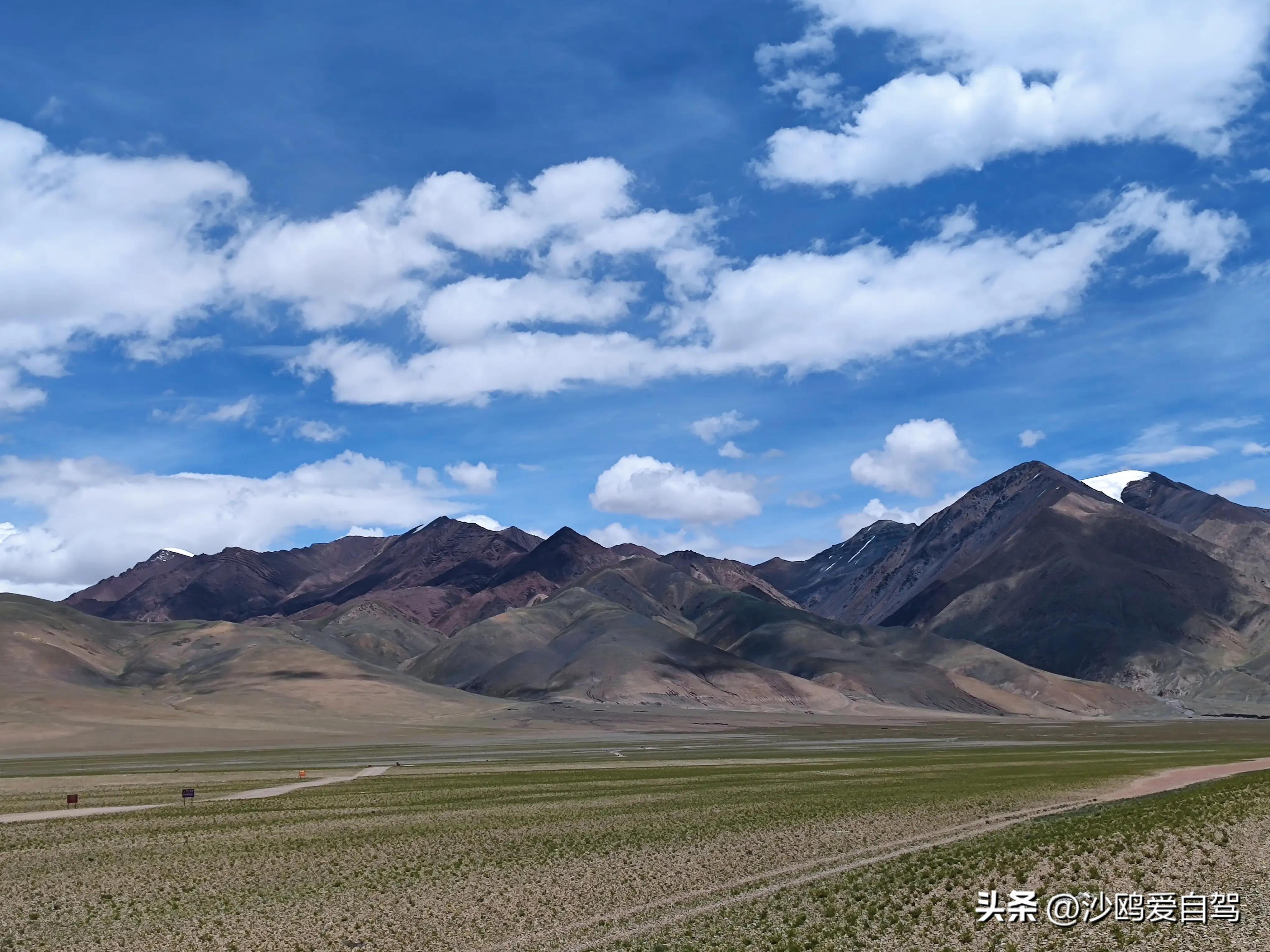 自驾四进*藏西***疆新**第12天:人在囧途:当惹雍措圣湖边陷车,轮胎鼓包