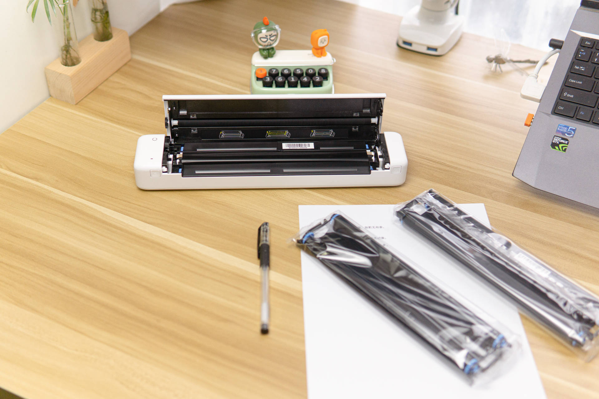 如何使用无墨迷你小型打印机,无需墨盒油纸就能打印的打印机