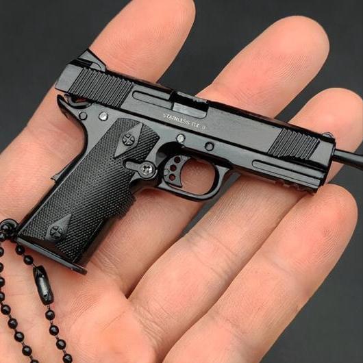 男子卖玩具枪获刑律师求法官,枪形钥匙扣获刑