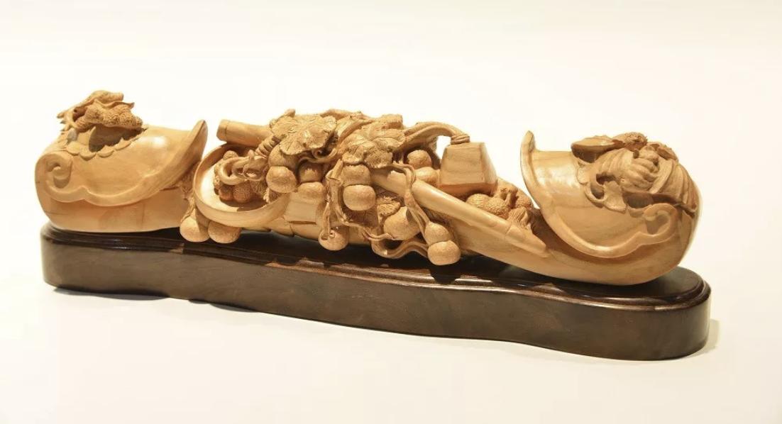 王来新——大胆创新推动桃木雕刻